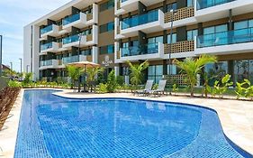 Mana Beach Flat completo - 2 quartos 2 banheiros 2 vagas garagem com vista para o mar e piscinas